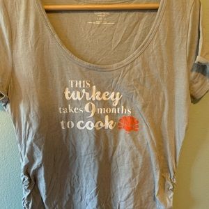 Motherhood Maternity graphic tee.